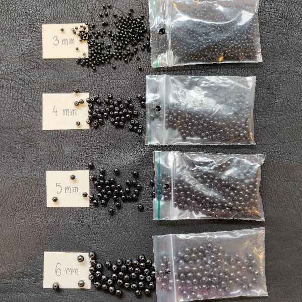 Sorte, helt runde perler
